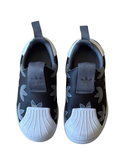 A White Slip Ons from Adidas in size 5T for neutral. (Front View)