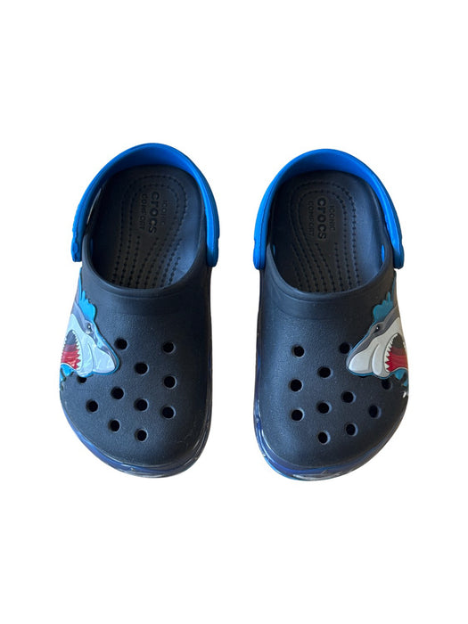 A Blue Slip Ons from Crocs in size 5T for boy. (Front View)