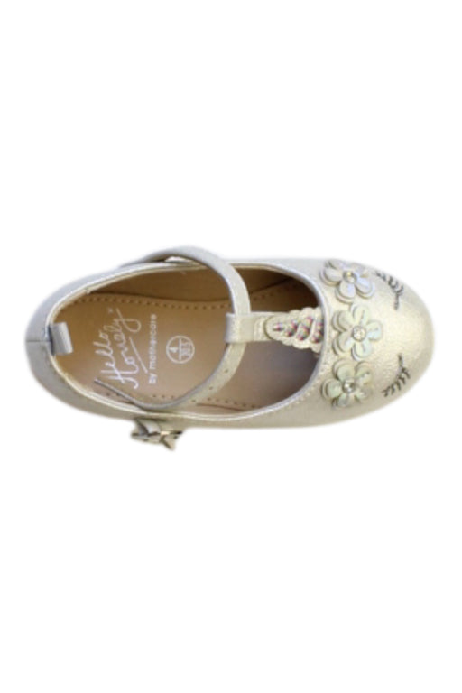A Gold Flats from Mothercare in size 12-18M for girl. (Front View)