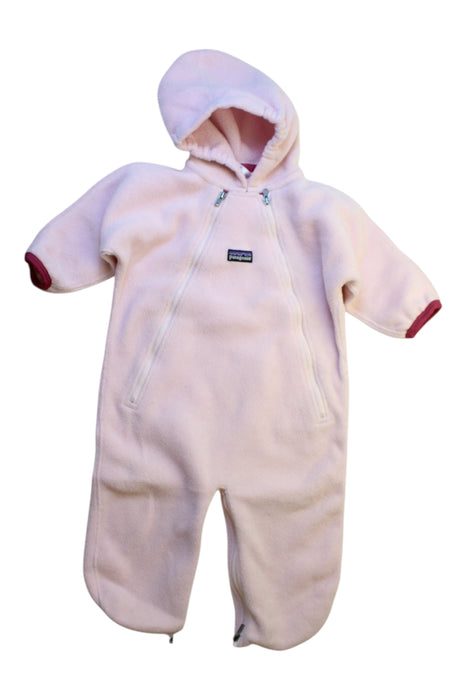 A Pink Snowsuits from Patagonia in size 6-12M for girl. (Front View)