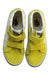 A Yellow Sneakers from Vans in size 7Y for girl. (Back View)