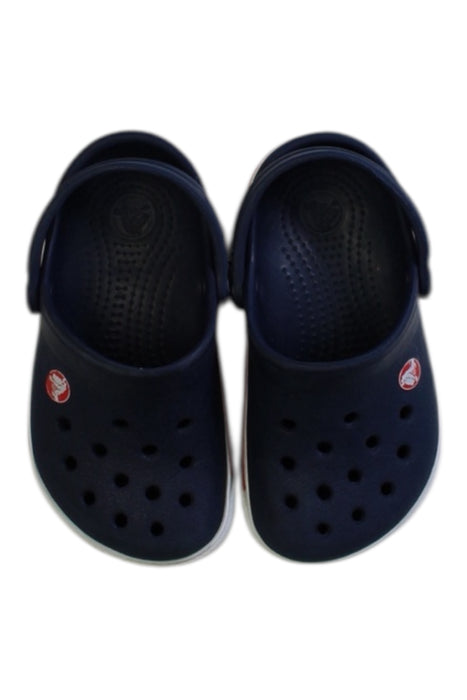 A Navy Slip Ons from Crocs in size 12-18M for boy. (Back View)