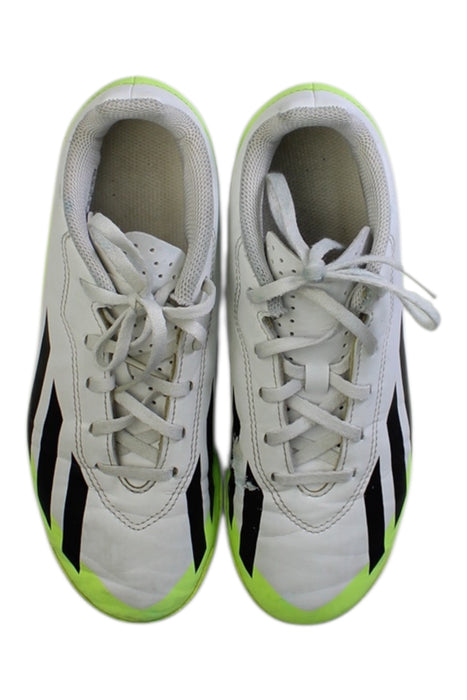 A White Cleats/Soccer Shoes from Adidas in size 12Y for boy. (Back View)