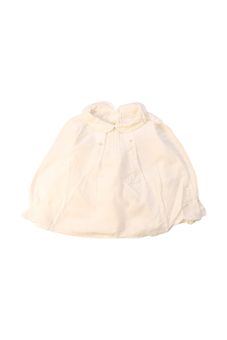 A White Long Sleeve Tops from Nanos in size 3-6M for girl. (Front View)