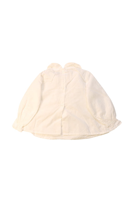 A White Long Sleeve Tops from Nanos in size 3-6M for girl. (Back View)