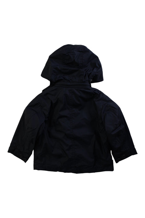 A Navy Rain Jackets from Burberry in size 3T for boy. (Back View)