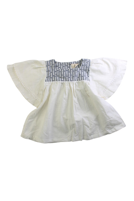 A White Short Sleeve Dresses from Little Cotton Clothes in size 4T for girl. (Front View)