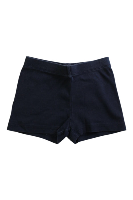 A Navy Shorts from Tea in size 5T for girl. (Front View)