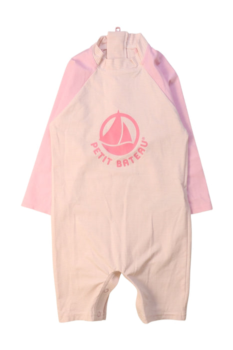 A Pink Long Sleeve Rompers from Petit Bateau in size 2T for girl. (Front View)