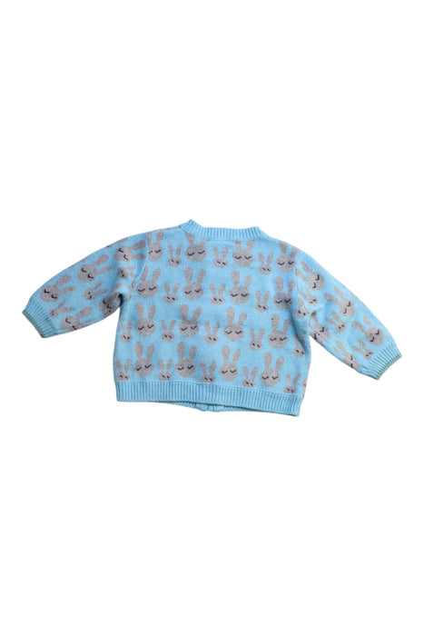A Blue Cardigans from The Bonnie Mob in size 6-12M for neutral. (Back View)