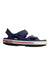 A Navy Sandals from Crocs in size 5T for boy. (Front View)