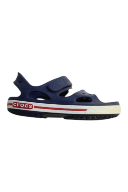 A Navy Sandals from Crocs in size 5T for boy. (Front View)