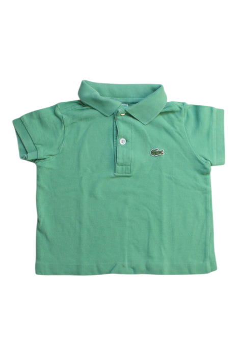 A Green Short Sleeve Polos from Lacoste in size 2T for boy. (Front View)