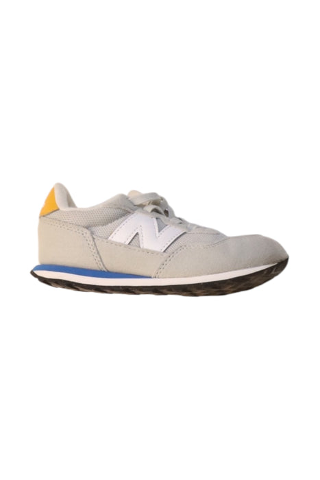 A Beige Sneakers from New Balance in size 4T for neutral. (Front View)