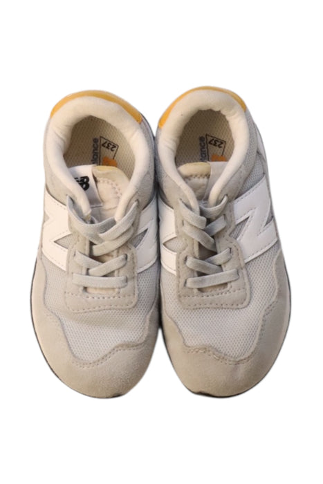 A Beige Sneakers from New Balance in size 4T for neutral. (Back View)