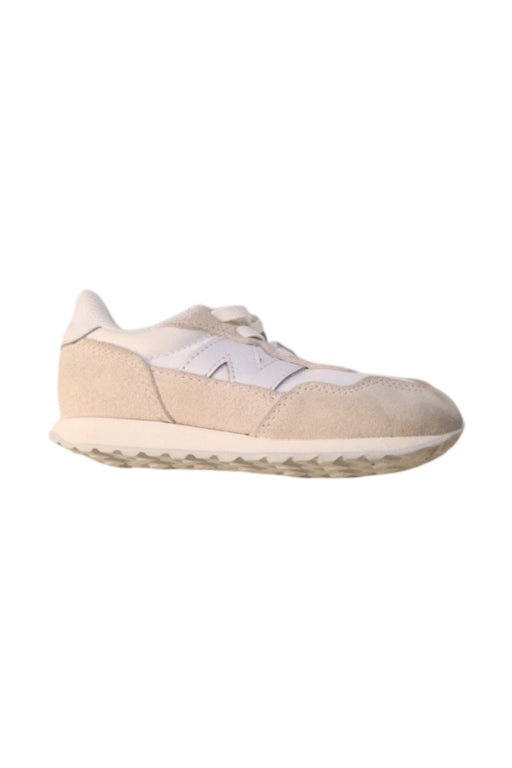A Beige Sneakers from New Balance in size 4T for neutral. (Front View)