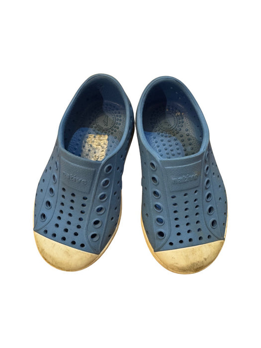 A Blue Slip Ons from Native Shoes in size 12-18M for neutral. (Front View)