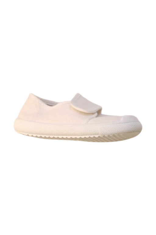 A White Slip Ons from Hampton Classics in size 3T for neutral. (Front View)