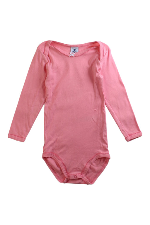 A Pink Long Sleeve Bodysuits from Petit Bateau in size 2T for girl. (Front View)