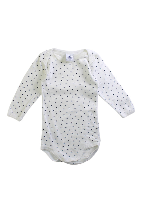 A White Long Sleeve Bodysuits from Petit Bateau in size 3-6M for girl. (Front View)