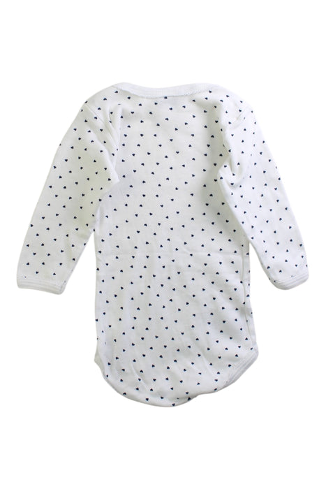 A White Long Sleeve Bodysuits from Petit Bateau in size 3-6M for girl. (Back View)