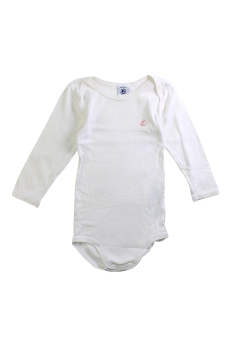 A White Long Sleeve Bodysuits from Petit Bateau in size 12-18M for neutral. (Front View)