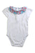A White Short Sleeve Bodysuits from Jacadi in size 6-12M for girl. (Front View)