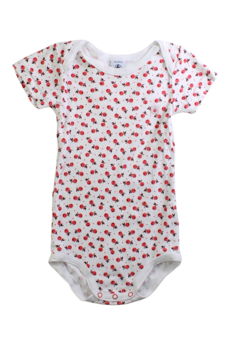 A White Short Sleeve Bodysuits from Petit Bateau in size 12-18M for girl. (Front View)