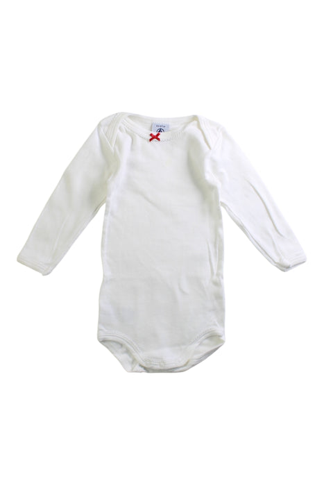 A White Long Sleeve Bodysuits from Petit Bateau in size 3-6M for girl. (Front View)