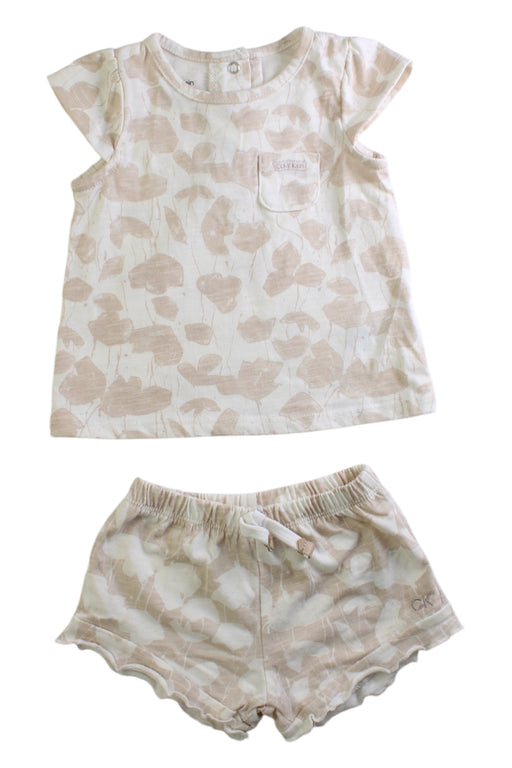 A Beige Shorts Sets from Calvin Klein in size 6-12M for girl. (Front View)
