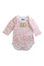 A Pink Long Sleeve Bodysuits from Juicy Couture in size 0-3M for girl. (Front View)