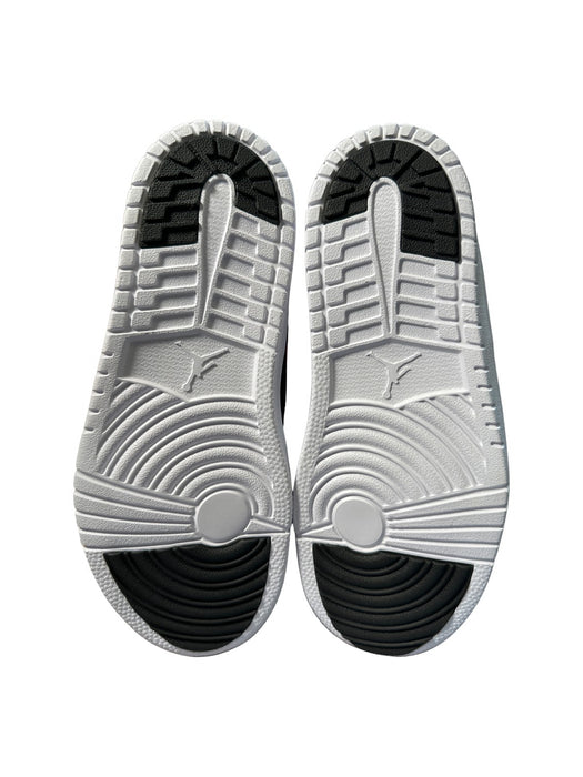 A Black Sneakers from Air Jordan in size 7Y for neutral. (Back View)