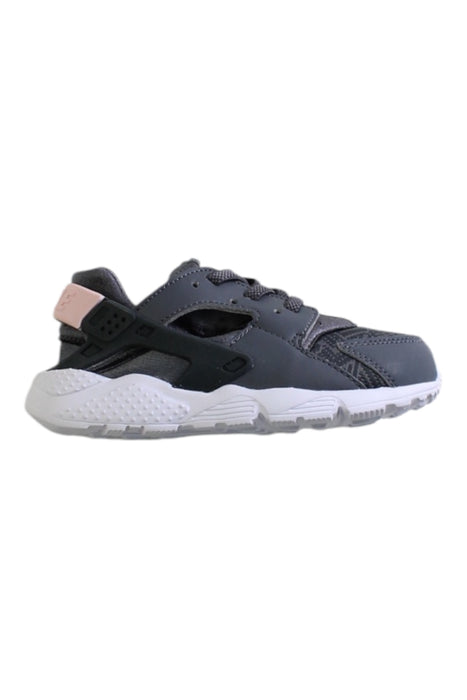 A Grey Sneakers from Nike in size 4T for girl. (Front View)
