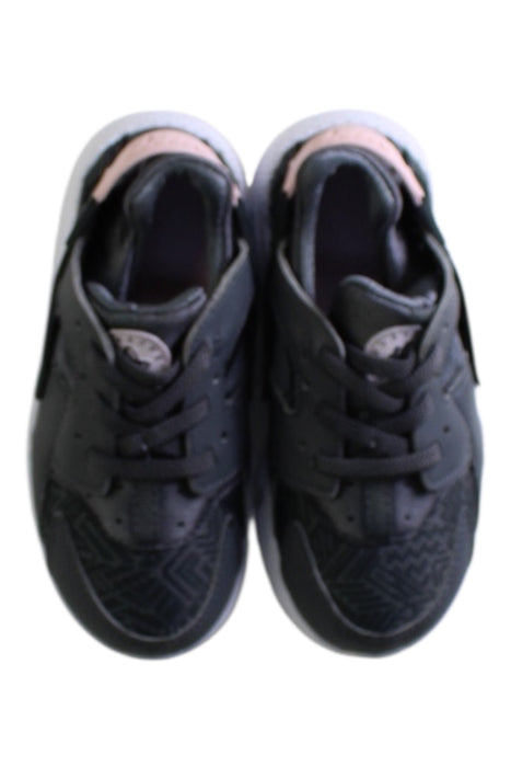 A Grey Sneakers from Nike in size 4T for girl. (Back View)