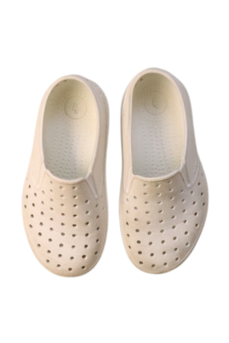 A White Slip Ons from Native Shoes in size 5T for neutral. (Back View)