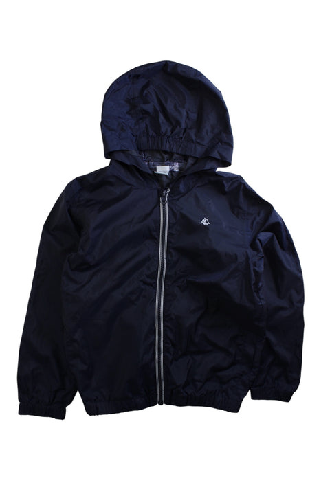 A Navy Rain Jackets from Petit Bateau in size 6T for neutral. (Back View)