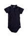 A Navy Short Sleeve Bodysuits from Petit Bateau in size 3T for neutral. (Front View)