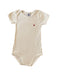 A White Short Sleeve Bodysuits from Petit Bateau in size 3T for neutral. (Front View)