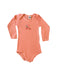 A Peach Long Sleeve Bodysuits from Petit Bateau in size 18-24M for neutral. (Front View)