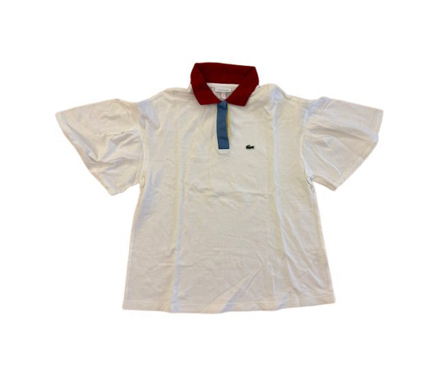 A White Short Sleeve Polos from Lacoste in size 12Y for girl. (Front View)