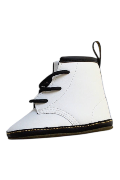 A White Booties from Dr. Martens in size 3-6M for neutral. (Front View)
