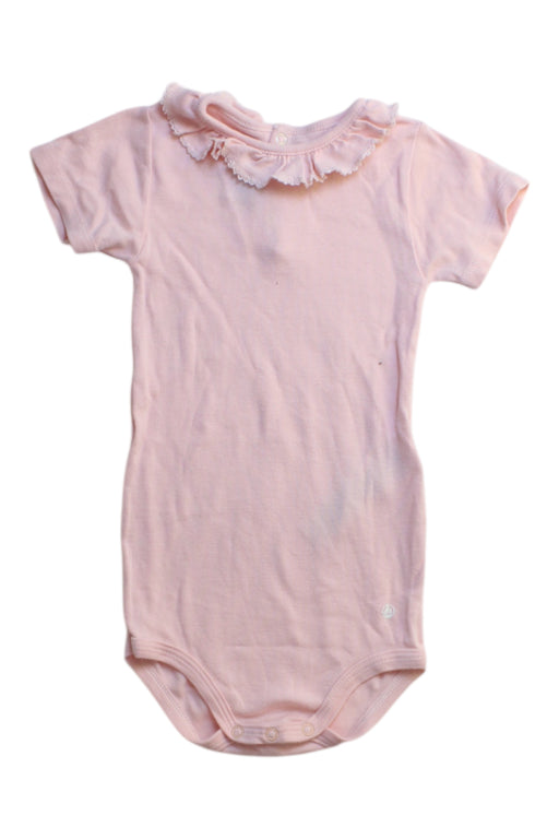 A Pink Short Sleeve Bodysuits from Petit Bateau in size 12-18M for girl. (Front View)