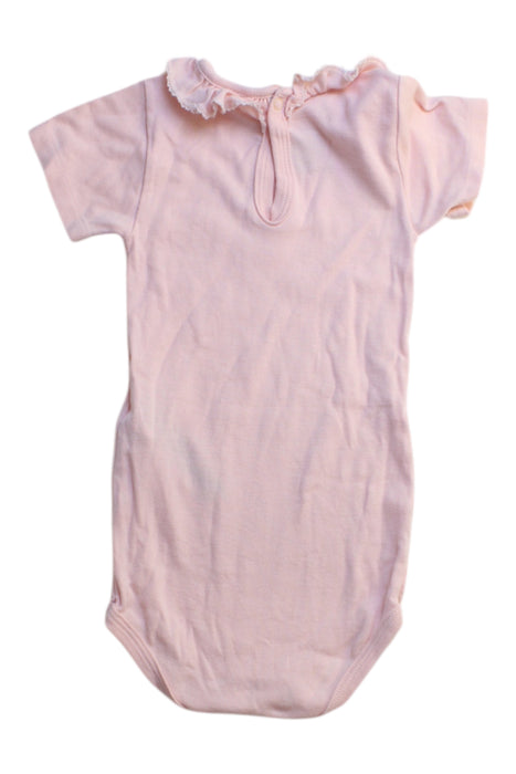 A Pink Short Sleeve Bodysuits from Petit Bateau in size 12-18M for girl. (Back View)
