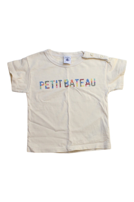A Beige Short Sleeve T Shirts from Petit Bateau in size 12-18M for girl. (Front View)