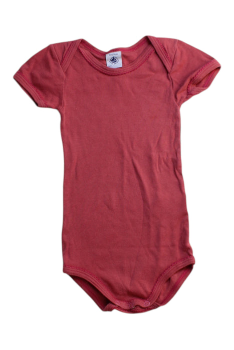 A Red Short Sleeve Bodysuits from Petit Bateau in size 6-12M for girl. (Front View)