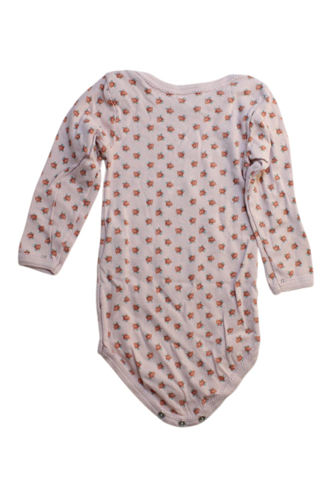 A Beige Long Sleeve Bodysuits from Petit Bateau in size 12-18M for girl. (Back View)