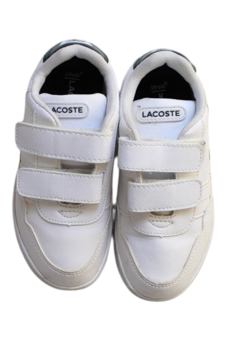 A White Sneakers from Lacoste in size 3T for boy. (Back View)