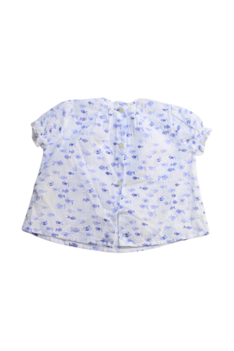A Blue Short Sleeve Tops from Nanos in size 6-12M for girl. (Back View)