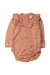 A Peach Long Sleeve Bodysuits from Wilson & Frenchy in size 6-12M for girl. (Front View)