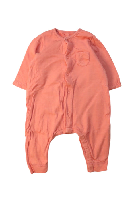A Peach Long Sleeve Rompers from Petit Bateau in size 0-3M for neutral. (Front View)